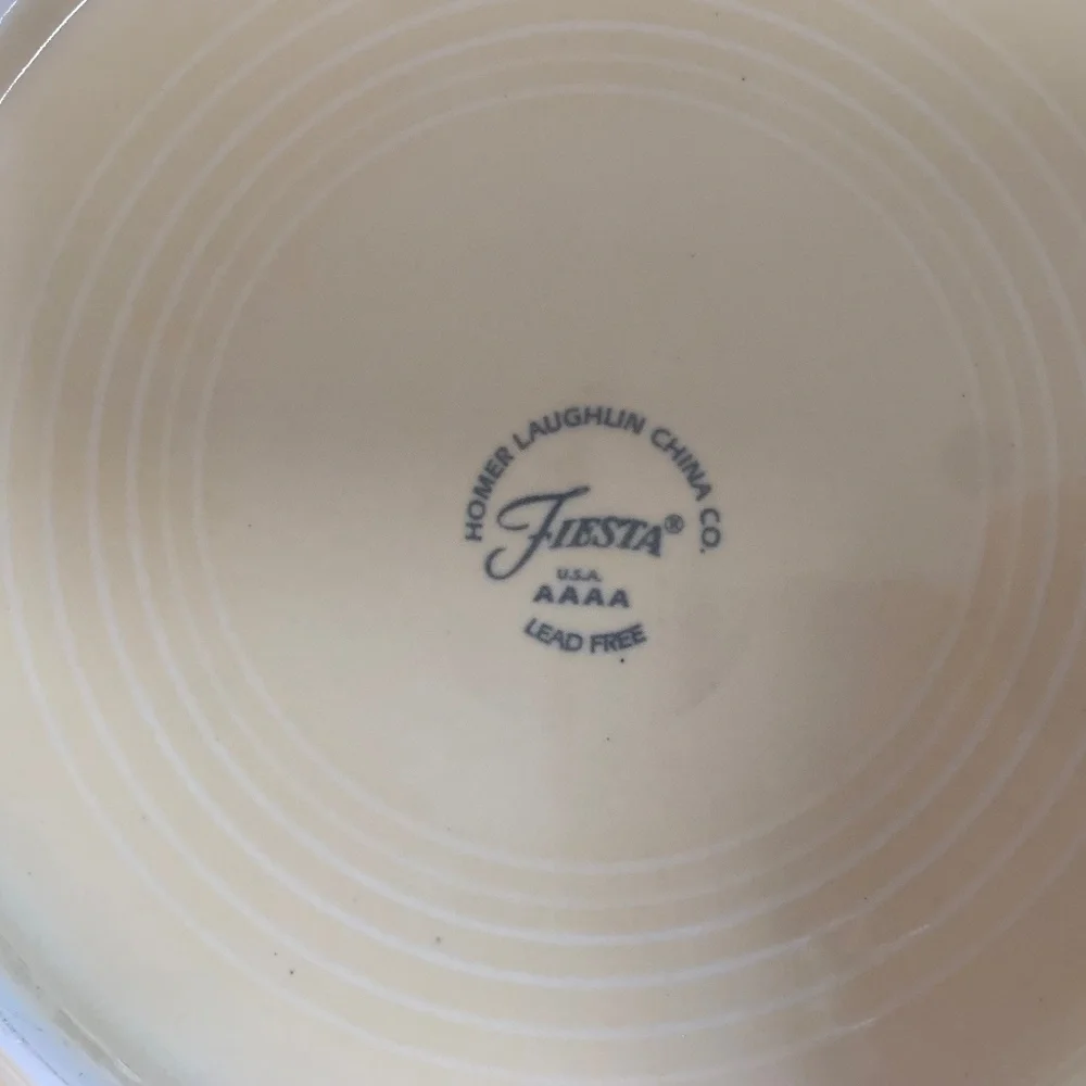 Two Fiesta Ivory Dinner Plates